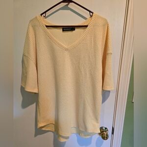YELLOW women's size large waffle shirt.